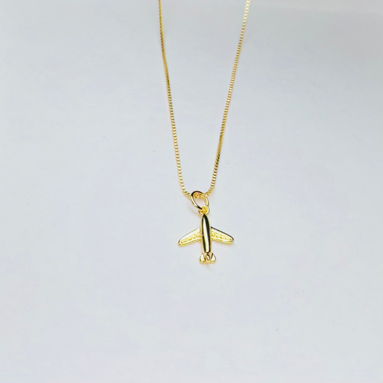18K gold chain with 18K airplane charm