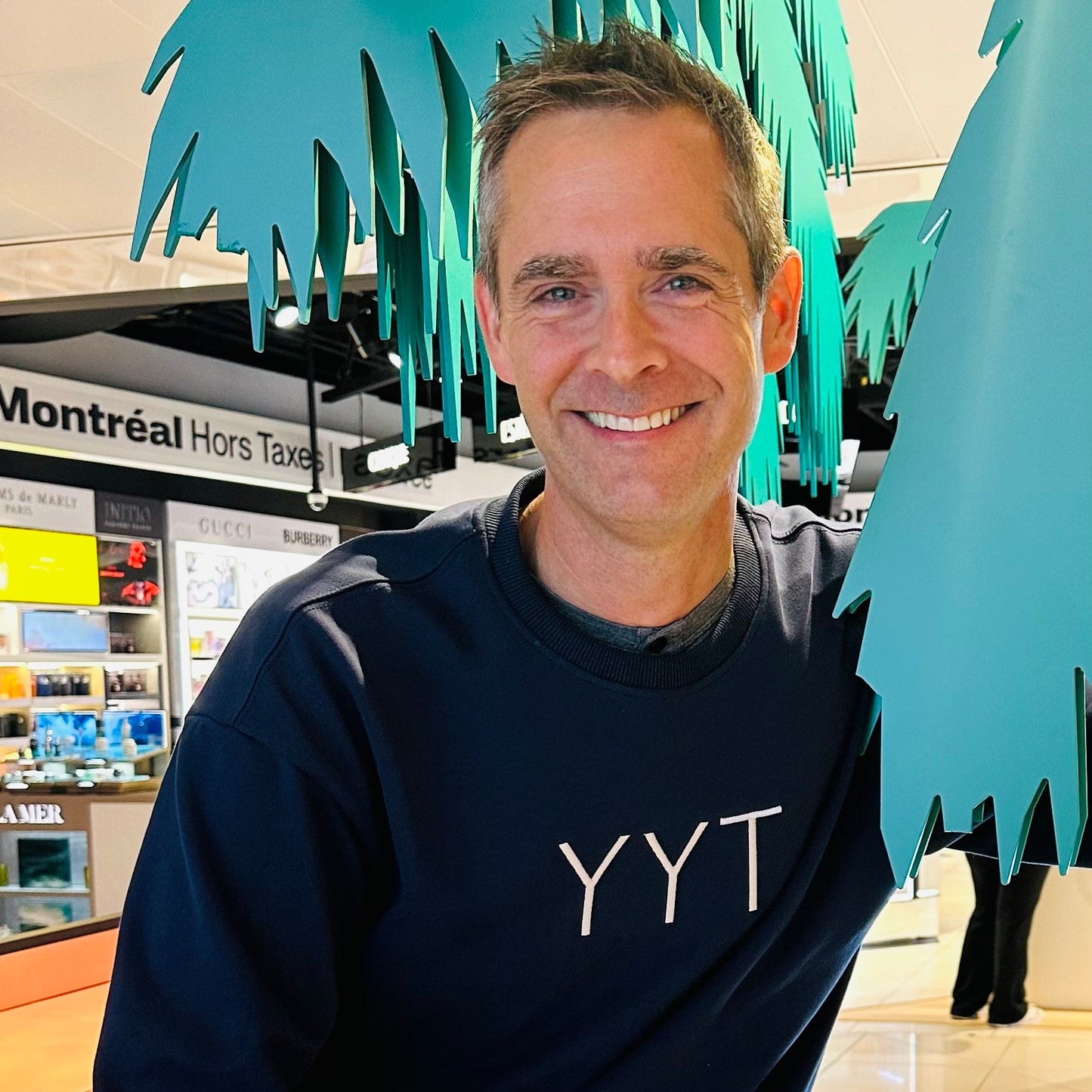 YYT Navy center logo