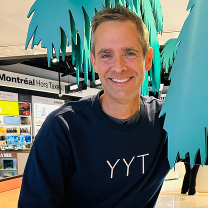 YYT Navy center logo