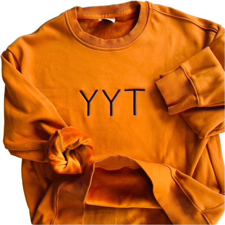 YYT Caramel center logo