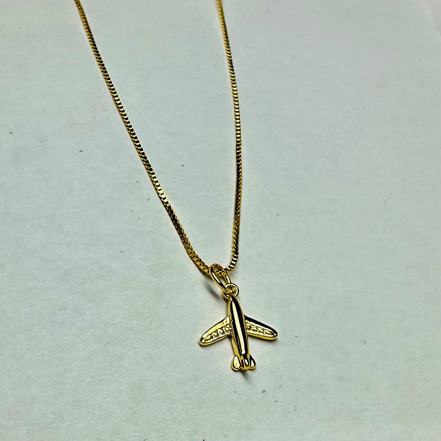 18K gold chain with 18K airplane charm