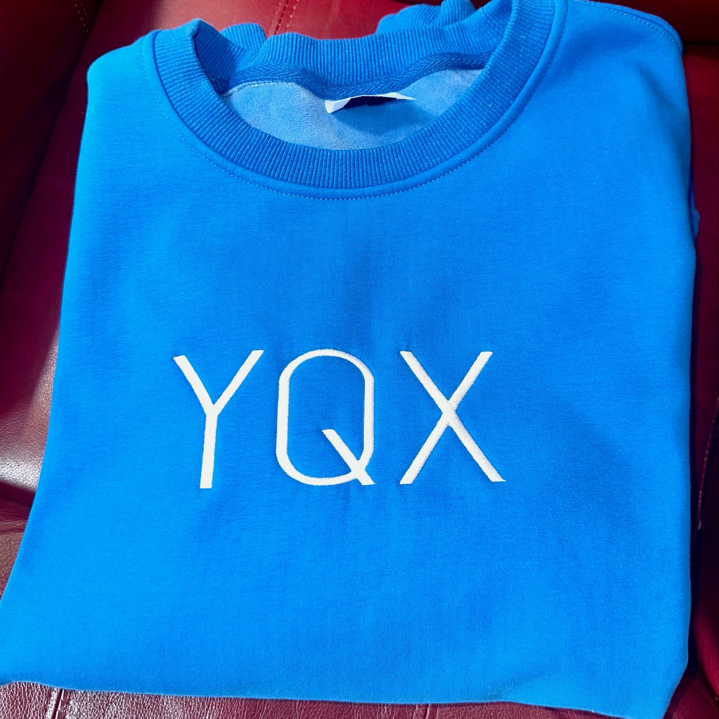 YQX Paradise Blue center logo