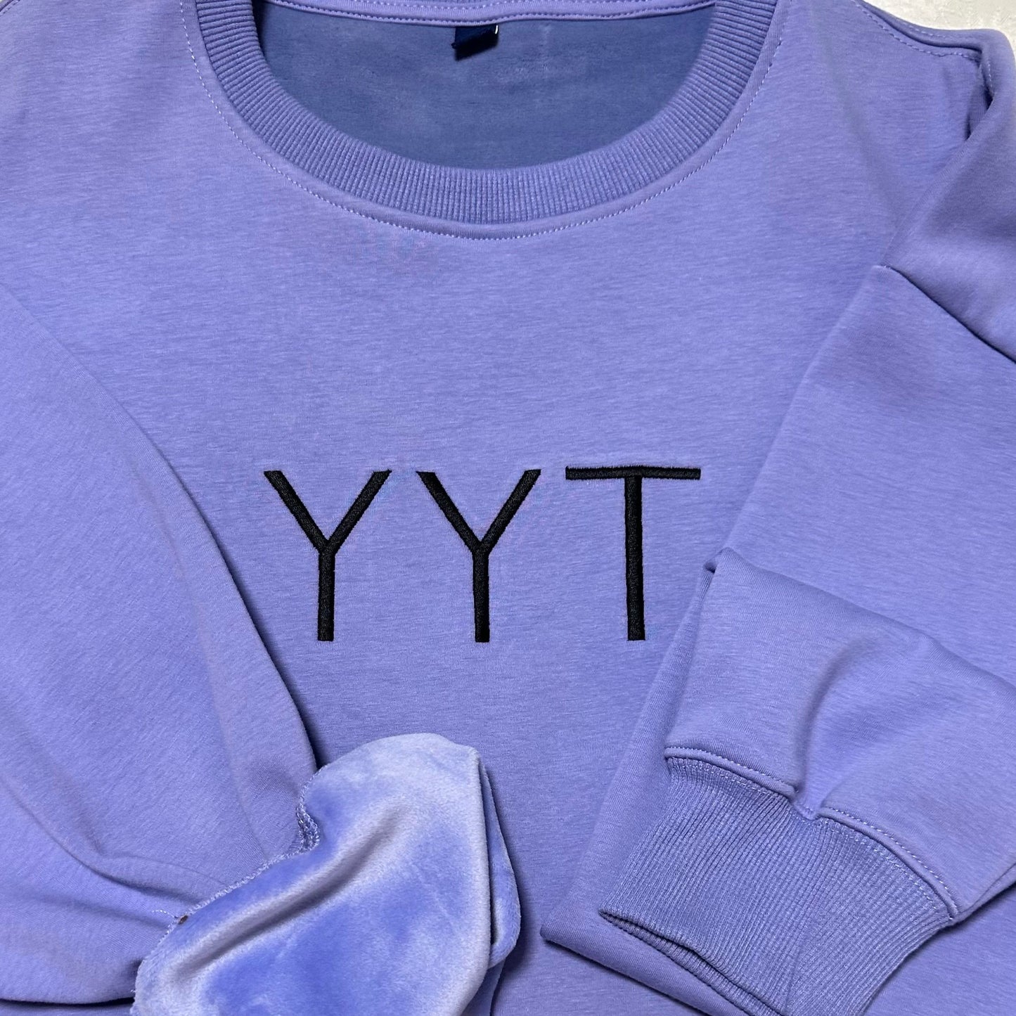 YYT Lilac center logo